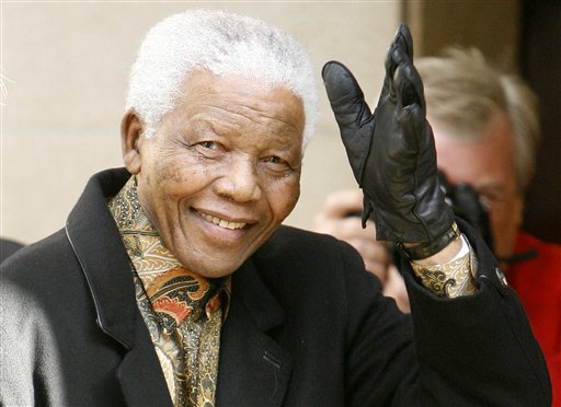 Former president of South Africa Nelson Mandela arrives at a hotel in central London, Monday, June 23, 2008.  Mandela arrived in London Monday for a week of events to celebrate his 90th birthday, including an outdoor concert in his honor at Hyde Park on Friday with Proceeds going to his 46664 charity.(AP Photo/Akira Suemori)